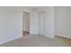 Neutral bedroom featuring a large closet and attached bathroom providing a cozy and functional living space at 182 Foxford Dr., Conway, SC 29526