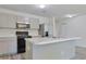 Modern kitchen with marble countertops, gray cabinets, and stainless steel appliances at 182 Foxford Dr., Conway, SC 29526