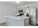 Kitchen island with stainless steel appliances and marbled countertops, ready for cooking at 182 Foxford Dr., Conway, SC 29526
