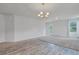 Bright living area showcases a seamless transition to the dining space and backyard access at 182 Foxford Dr., Conway, SC 29526