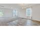 Open-plan living area features plush carpet, hardwood flooring and natural light at 182 Foxford Dr., Conway, SC 29526