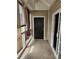 Cozy screened porch with sliding glass door and space for relaxation with natural light and outdoor access at 197 Charter Dr. # D1, Longs, SC 29568