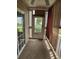 Relaxing screened porch with ample natural light and scenic views with neutral tones and outdoor access at 197 Charter Dr. # D1, Longs, SC 29568