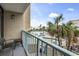 Balcony overlooking a pool, beach, and palm trees at 201 74Th Ave. N # 2243/2244, Myrtle Beach, SC 29572