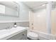 Modern bathroom featuring a vanity with a mirror, a toilet, and a bathtub with a shower at 201 74Th Ave. N # 2243/2244, Myrtle Beach, SC 29572
