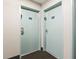 Condo hallway with two light blue doors, each with a room number plaque at 201 74Th Ave. N # 2243/2244, Myrtle Beach, SC 29572