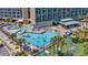 Aerial view of pool with lazy river, lounge chairs, and recreation area at 201 74Th Ave. N # 2243/2244, Myrtle Beach, SC 29572