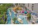 Aerial view of large lazy river with waterpark, slides and lounge area at 201 74Th Ave. N # 2243/2244, Myrtle Beach, SC 29572