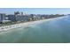 Stunning aerial view of the beach and ocean with people and many tall buildings at 201 N 74Th Ave. N # 2249/2250, Myrtle Beach, SC 29572