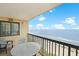 Balcony with ocean view, seating for two, offers a relaxing outdoor space at 201 S Ocean Blvd. # 1106, North Myrtle Beach, SC 29582