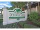 The sign reads: Ocean Bay Club at 201 S Ocean Blvd. # 1106, North Myrtle Beach, SC 29582
