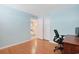 Office with wood-look flooring and doorway to a bathroom at 201 S Ocean Blvd. # 1106, North Myrtle Beach, SC 29582