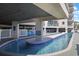 Enjoy the lazy river pool feature, surrounded by the building's supporting pillars at 201 S Ocean Blvd. # 1106, North Myrtle Beach, SC 29582