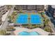 Aerial view featuring the pool and tennis courts for outdoor recreation opportunities at 202 North Ocean Blvd. # 109, North Myrtle Beach, SC 29582