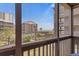 Expansive balcony view of the pool and scenic ocean beyond the resort grounds at 202 North Ocean Blvd. # 109, North Myrtle Beach, SC 29582