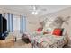 Charming bedroom featuring twin beds, coastal decor, and ample natural light at 202 North Ocean Blvd. # 109, North Myrtle Beach, SC 29582