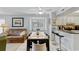 Dining area and a look into the updated kitchen at 202 North Ocean Blvd. # 109, North Myrtle Beach, SC 29582