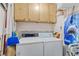 This laundry room offers practical space with storage and side by side washer and dryer hookups at 202 North Ocean Blvd. # 109, North Myrtle Beach, SC 29582