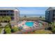 Inviting outdoor pool area near the beach, perfect for relaxation and enjoying the ocean view at 202 North Ocean Blvd. # 109, North Myrtle Beach, SC 29582