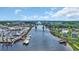 Wide aerial view of community along river and bridge at 214 Olde Harbour Ct, Little River, SC 29566
