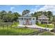 Inviting home with a double-door garage and a charming front porch, perfect for enjoying the outdoors at 214 Olde Harbour Ct, Little River, SC 29566