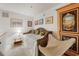 Cozy bedroom displaying unique wicker furniture, light neutral walls, and eclectic artwork at 214 Sea Island Dr., Georgetown, SC 29440