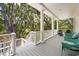 Outdoor porch with seating overlooking a picturesque natural backdrop at 214 Sea Island Dr., Georgetown, SC 29440
