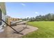 This home has a well-kept backyard with a hammock on a brick patio, perfect for relaxing outdoors at 223 Southgate Ct., Pawleys Island, SC 29585