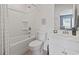 Bathroom featuring a tub, toilet, vanity and neutral paint at 223 Southgate Ct., Pawleys Island, SC 29585