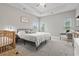 Spacious main bedroom featuring soft carpet, tray ceilings, and calming neutral paint at 223 Southgate Ct., Pawleys Island, SC 29585