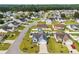 Aerial view of the neighborhood showcasing the beautiful properties, green lawns, and tree lined streets at 252 Heath Dr., Longs, SC 29568