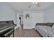 Bedroom with hardwood floors, a daybed, and a piano at 252 Heath Dr., Longs, SC 29568