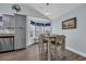 Dining area features lots of natural light, vaulted ceiling and is decorated with charming coastal accents at 252 Heath Dr., Longs, SC 29568