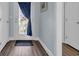 Home foyer featuring a decorative glass window, wood-look flooring, and paneled doors at 252 Heath Dr., Longs, SC 29568
