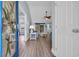 Inviting foyer showcasing the living room with wood floors, ceiling fan, and neutral tones at 252 Heath Dr., Longs, SC 29568