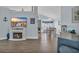 Comfortable living space features wood floors, fireplace and adjoins the dining area for easy entertaining at 252 Heath Dr., Longs, SC 29568