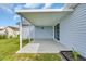 Covered patio with sliding glass door and view of the backyard at 252 Heath Dr., Longs, SC 29568