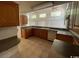 Spacious kitchen with oak cabinets, and large window at 2862 Loblolly Ave., Little River, SC 29566