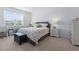 Bright bedroom with carpet, a window, and a cozy floral-patterned bed at 3078 Gillham Loop, Myrtle Beach, SC 29588