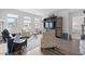 Inviting living room filled with natural light, showcasing hardwood floors, comfortable seating, and stylish decor at 3078 Gillham Loop, Myrtle Beach, SC 29588
