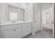 A bright bathroom offers a double sink vanity at 3573 Bells Lake Circle, Longs, SC 29568