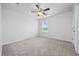 Bright bedroom featuring a ceiling fan, neutral walls and plush carpet at 3573 Bells Lake Circle, Longs, SC 29568