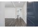 Welcoming entryway with durable floors leading to an open floorplan and staircase at 3573 Bells Lake Circle, Longs, SC 29568