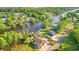 Aerial shot showcasing the house, pool, private docks, and the scenic waterfront location at 3721 Ed Smith Ave., Myrtle Beach, SC 29588