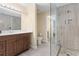Well-appointed bathroom features a walk-in shower, a granite countertop, and modern fixtures at 3721 Ed Smith Ave., Myrtle Beach, SC 29588