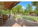 Wooden deck with an awning and views of the fenced backyard with a gazebo at 3721 Ed Smith Ave., Myrtle Beach, SC 29588