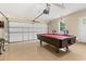 Spacious garage features a pool table, high ceilings, and ample room for parking and recreation at 3721 Ed Smith Ave., Myrtle Beach, SC 29588