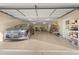 Organized garage space with a car, ample storage, and functional layout, perfect for hobbies and projects at 3721 Ed Smith Ave., Myrtle Beach, SC 29588