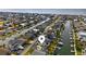 An aerial view of a waterfront community showcasing houses lining canals, offering serene water views and boat access at 39 Newport St., Ocean Isle Beach, NC 28469