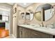 Bathroom with double vanity, modern mirrors and granite countertops at 39 Newport St., Ocean Isle Beach, NC 28469